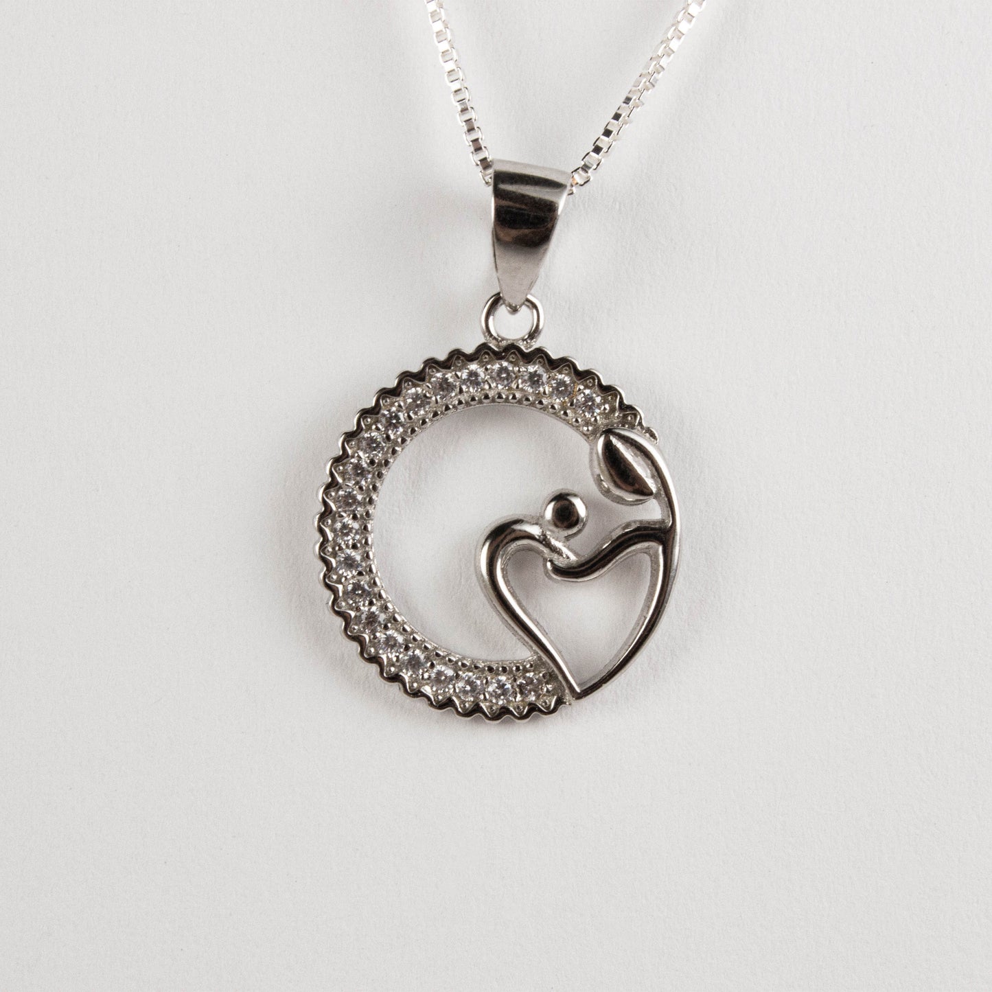 MOM NURTURING CHILD NECKLACE